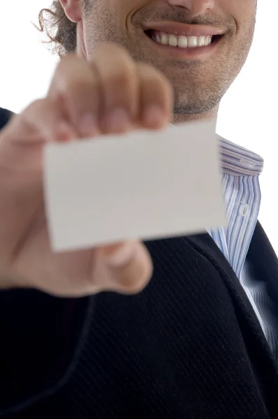 Smiling ceo holding business card — Stock Photo, Image