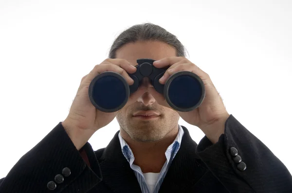 Ejecutivo mirando a través de prismáticos — Foto de Stock