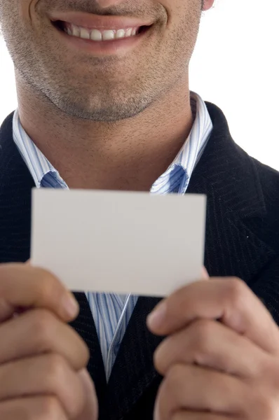 Young executive holding business card — Stock Photo, Image