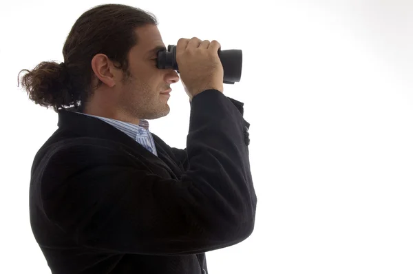 Podnikatel se dívá dalekohledem — Stock fotografie