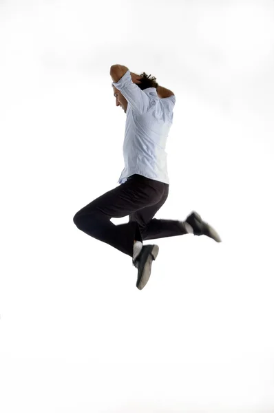 Handsome model jumping high in air — Stock Photo, Image