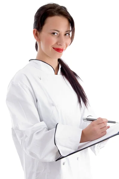 Giovane chef donna con appunti — Foto Stock