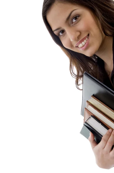 Usměvavá studentka s knihami — Stock fotografie