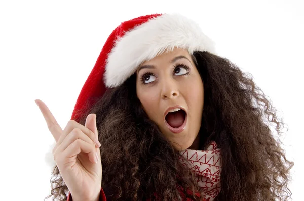 Christmas girl pointing aside — Stock Photo, Image