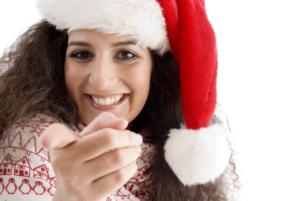 Pointing emale with christmas hat — Stock Photo, Image