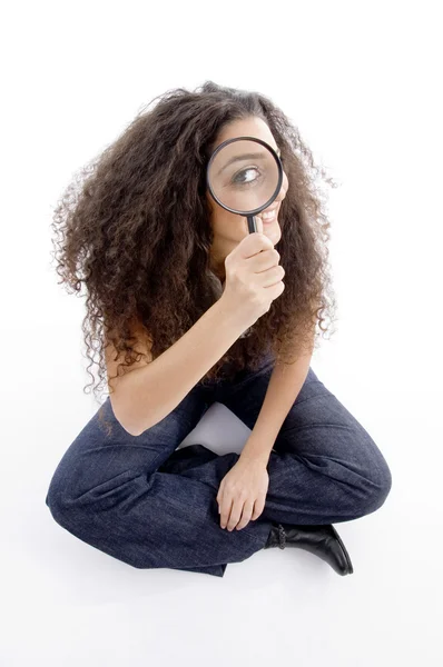 Latin american female holding magnifier — Stock Photo, Image