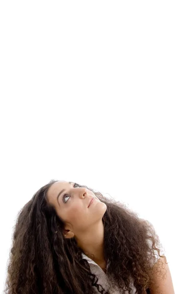 Attractive young woman looking upwards — Stock Photo, Image