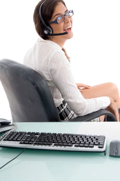 Young female tele caller with headset — Stock Photo, Image