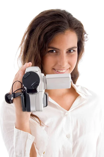 Smiling woman holding video camera — Stock Photo, Image