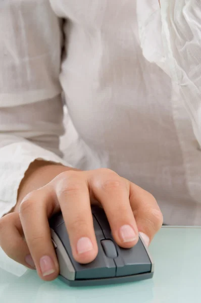 Close up of woman's hand on mouse — Stock Photo, Image