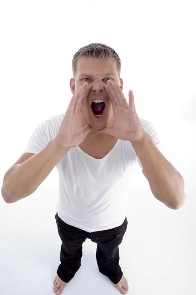 Pohledný mladý muž křičí — Stock fotografie