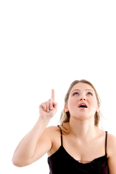Pretty woman pointing upwards — Stock Photo, Image