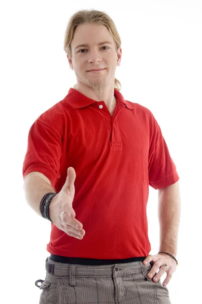 Inteligentny młody człowiek oferuje uścisk dłoni — Zdjęcie stockowe