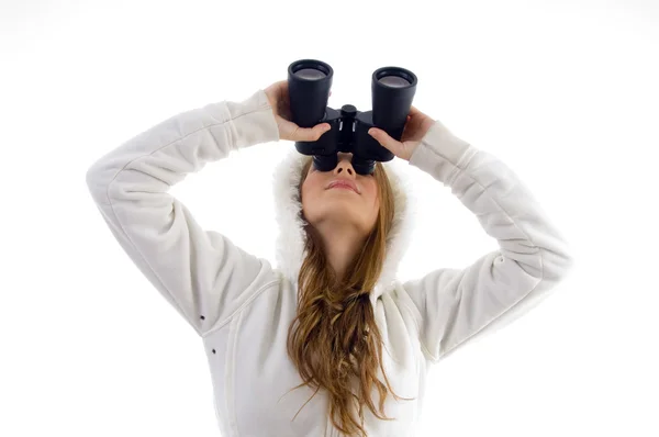 Žena dívá dalekohledem — Stock fotografie