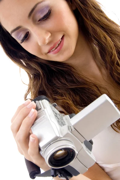 Professional woman operating handycam — Stock Photo, Image