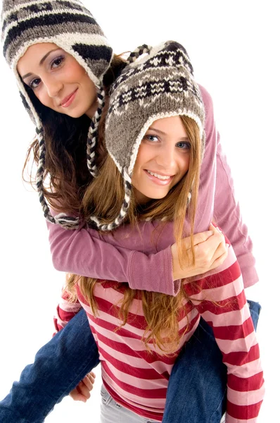 Joven chica dando piggyback a amigo —  Fotos de Stock