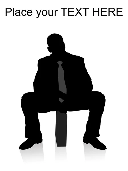Silhouette of businessman sitting on bag — Stock Photo, Image