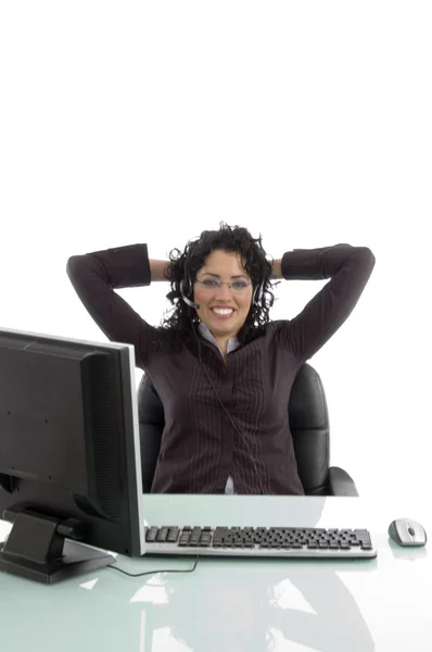 Businesswoman relaxing in her office — Stock Photo, Image