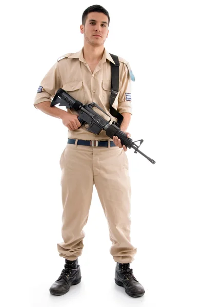 Retrato de militar masculino segurando arma — Fotografia de Stock