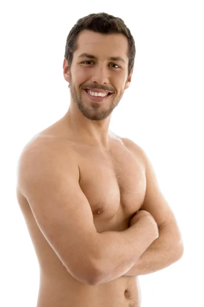 Мужчина без рубашки со сложенными руками — стоковое фото