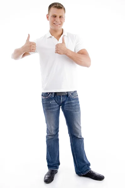 Usmívající se muž ukazuje palec — Stock fotografie