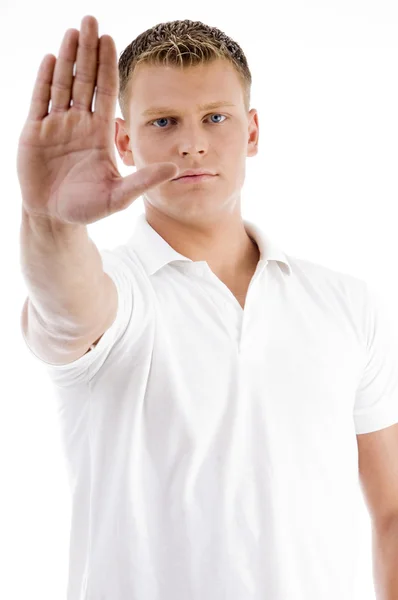 Pohledný muž v zastavení gesto — Stock fotografie