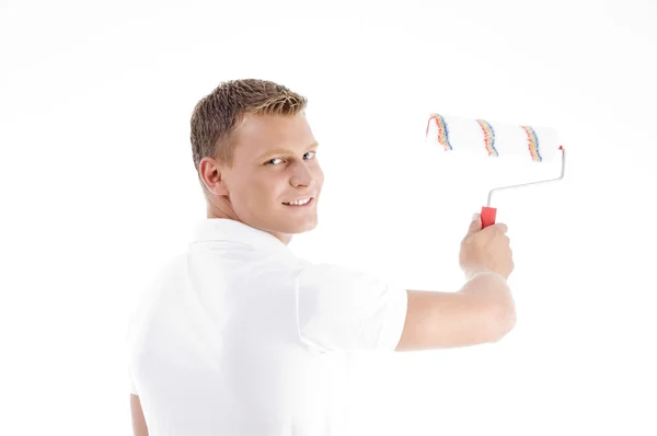 Rulo fırça ile erkek boyama — Stok fotoğraf