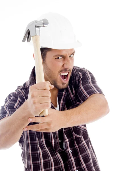 Arquitecto masculino en acción con martillo — Foto de Stock