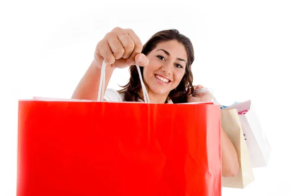 Portrait of woman showing shopping bags — Stock Photo, Image
