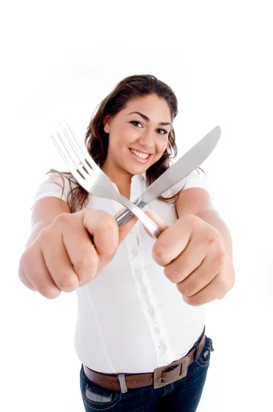 Jonge vrouwelijke chef-kok met mes en vork — Stockfoto