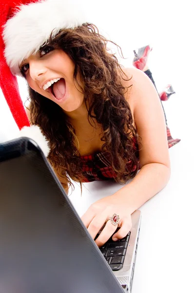 Christmas lady working on laptop — Stock Photo, Image