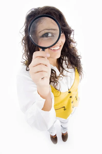 Young girl holding magnifier — Stock Photo, Image