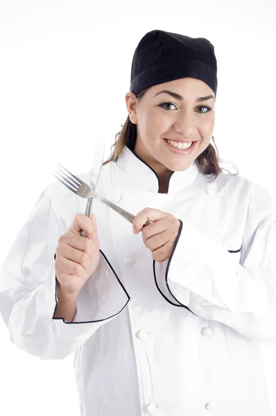 Jonge chef-kok houden metalen bestek — Stockfoto