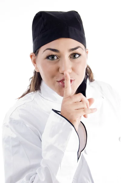 Szép chef shushing ujjal — Stock Fotó