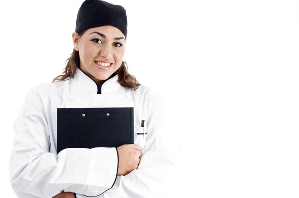 Gyönyörű női szakács gazdaság Jegyzettömb — Stock Fotó