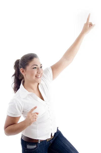 Ung attraktiv kvinna pekar uppåt — Stockfoto