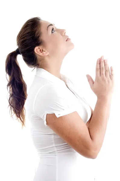 Schöne junge Frau betet — Stockfoto