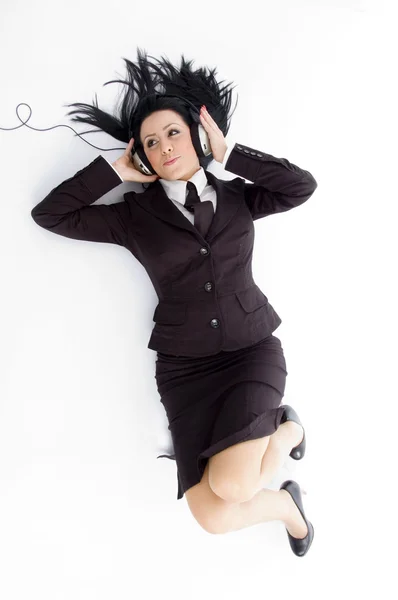 Mujer disfrutando de la música alta, en el suelo —  Fotos de Stock
