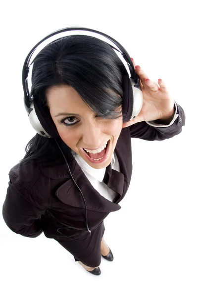 Young employee holding headphones — Stock Photo, Image