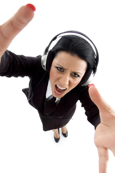 Businesswoman enjoying loud music — Stock Photo, Image