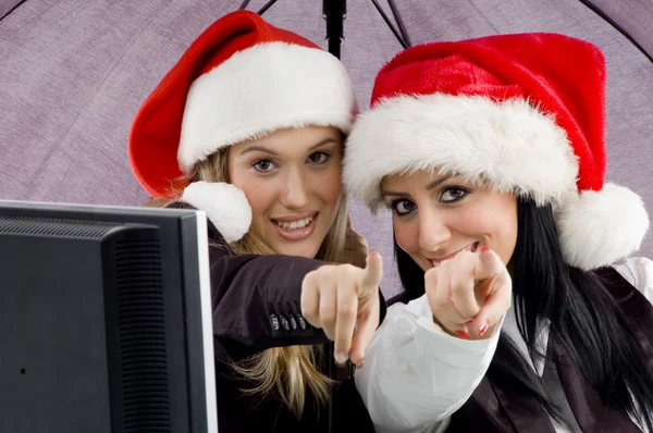 Colleagues wearing christmas hat — Stock Photo, Image