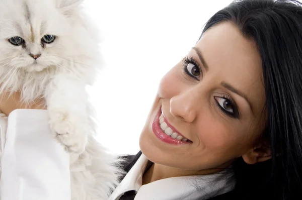 Young female holding her lovable cat — Stock Photo, Image