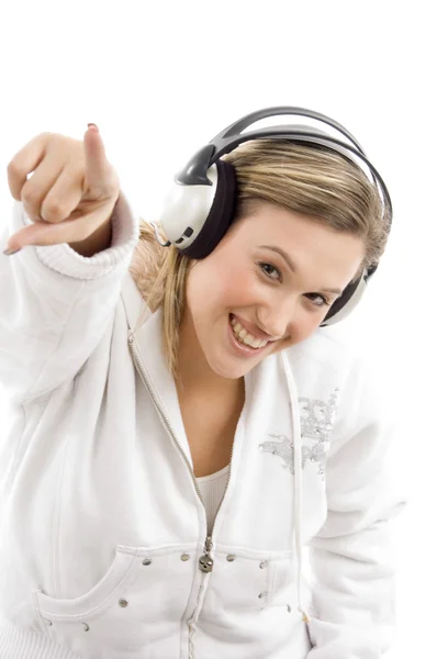 Cheerful young woman tuned in music — Stock Photo, Image