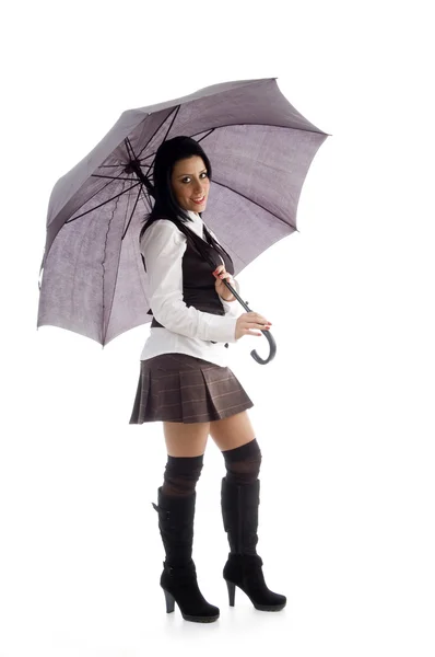 American woman under an umbrella — Stock Photo, Image