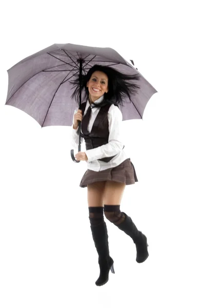 Mladá žena držící deštník — Stock fotografie