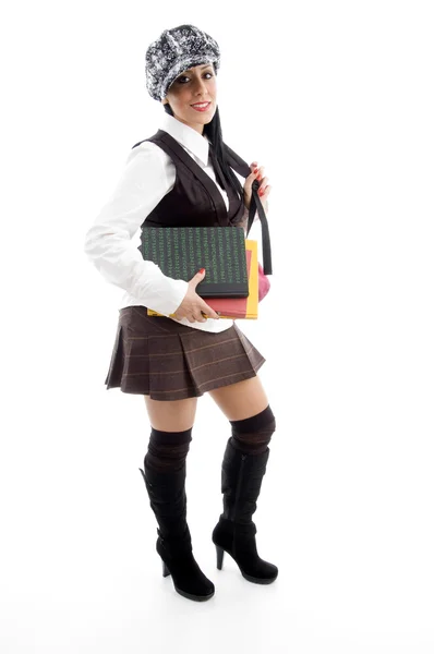 Student s její knihy a školní batoh — Stock fotografie