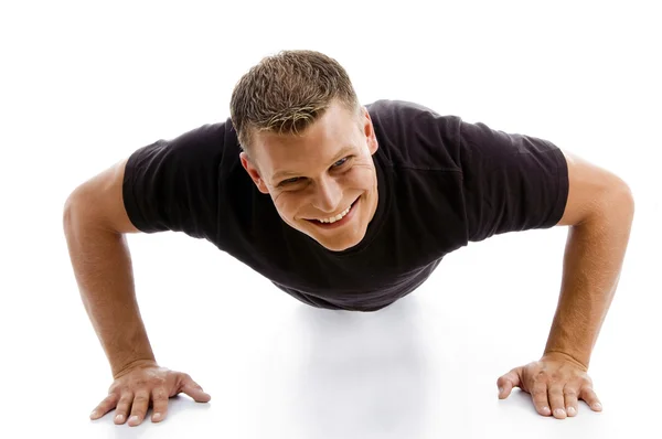 Mięśni mężczyzna robi push up — Zdjęcie stockowe