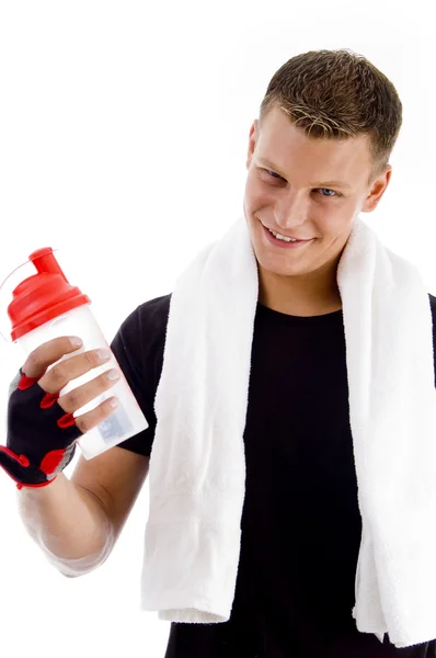 Homem muscular com garrafa de água — Fotografia de Stock