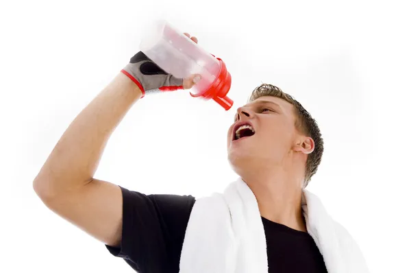 Muscular hombre beber agua de la botella —  Fotos de Stock