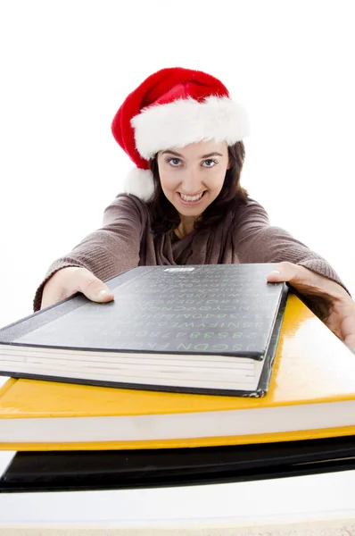 Navidad joven mujer con sus libros — Foto de Stock